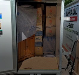 Boxes loaded carefully inside a storage container
